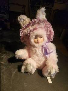 lot 59 image: Vintage bunny with baby face doll by Marie Osmond