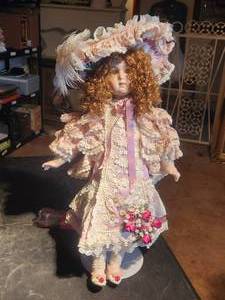 lot 60 image: Vintage tall collectible doll