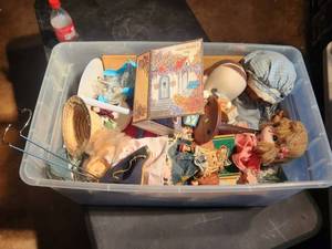 lot 51 image: Bin of collectible dolls and more
