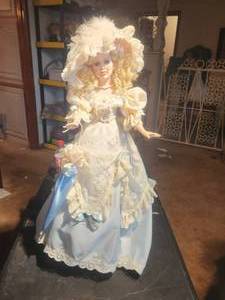 lot 47 image: Vintage tall collectible doll
