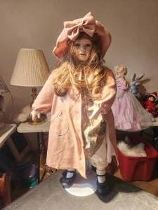 lot 42 image: Tall vintage collectible doll