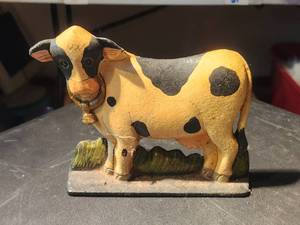 lot 15 image: Cast iron door stopper-holder