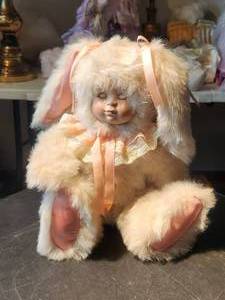 lot 9 image: Vintage plush bunny - kids face doll