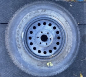 lot 320 image: Goodyear Wrangler Tire & Rim P26570R17 - In Condition As Shown