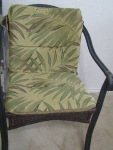 lot 34 image: wicker outdoor patio chair with padded cushion