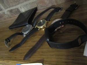 lot 73 image: various watches- watch bands- black wallet