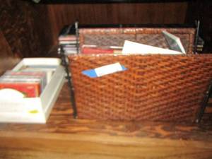 lot 81 image: Christmas CDs - other CDs - books - wicker basket - CD shelf