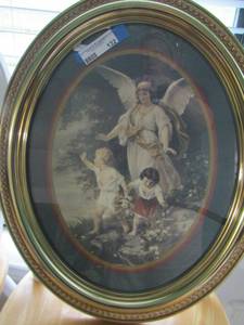 lot 132 image: oval framed art of angel and 2 babies glass is cracked