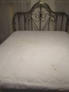 lot 18 image: Full size metal headboard with metal bed frame