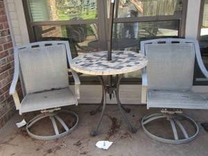 lot 182 image: 2 swivel patio chairs - round rack patio table with light in the middle