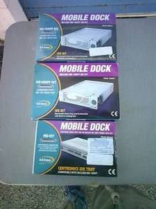 lot 5 image: 3-Mobile Docks, 2-MD10KFP Kits (1-Still in sealed package)  And 1-MD-15T Centronics IDE Tray