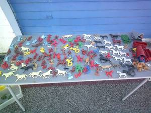 lot 32 image: Vintage Mixed Lot Of Plastic Cowboys & Indians, Horses, Saddles, Teepee, Trees and Wagons, Etc., Plus A Few Army Men