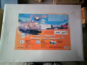 lot 1 image: Never Used- Lionel Train Set, Kraft  Nabisco 2002 Holiday Train Set Model 6-31950