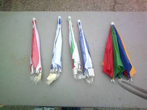 lot 64 image: Lot Of 4- 5-Striped Umbrella Hats, Mixed Colors