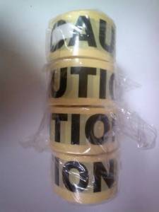 lot 76 image: 4-Rolls of 500-Ft Yellow With Bold Black Letters CAUTION-Tape -Non-Adhesive. NOTE 4 x Money