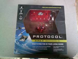 lot 95 image: PROTOCOL- Aura-X Remote Control UFO With Spinning Lights, #6182-2XR- NOTE This One Is Blue.