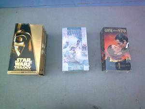 lot 113 image: Lot-3 Boxed Sets Of VCR Movies, 1-Sealed-Gone With The Wind, 1-Sealed Little Women And 1-Star Wars Trilogy-Special Edition