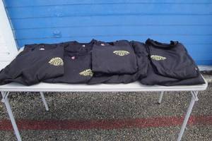 lot 185 image: 10- (4-M, 3-L &  3-4X ) Black Tee Shirts- NOTE Mixed Styles, Yours will Vary, Photos Are Examples Only, NOTE 10-X Money
