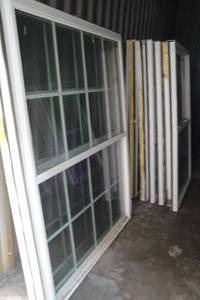 lot 214 image: Mixed Lot Of 16-3 Different Sizes Of -USED--Windows With Vinyl Frames, See Below For About Sizes.