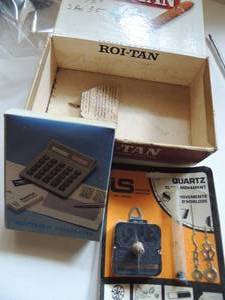 lot 700 image: ROI-TAN CIGAR BOX,  I S  CLOCK MOVEMENT,  CALCULATOR