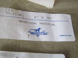 lot 24 image: Neoplush material   6 x 38   sand paper and saw blades