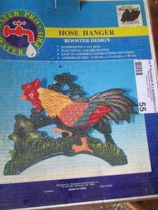 lot 55 image: rooster hose hanger metal