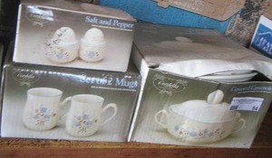 lot 54 image: Cordella dish set, covered casserole , S&P shakers, 2 mugs, creamer and covered sugar dish