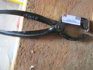 lot 64 image: leather hole punch