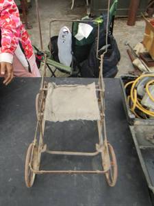 lot 108 image: Antique baby stroller needs repair