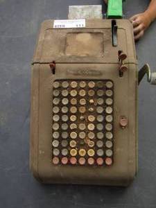 lot 111 image: VINTAGE LC Smith & CORONA ADDING MACHINE  missing a few buttons