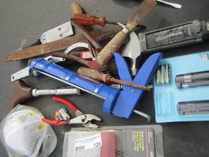 lot 129 image: tool lot- hammer plyers, grip handled and more