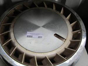 lot 201 image: plastic Chrysler hub caps set of 4