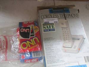 lot 230 image: cordless telephone in box, Uno and skip bo card games