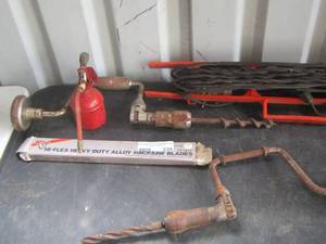 lot 239 image: oil pump canisters, driver tools, hacksaw blades