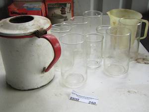 lot 250 image: drinking cups, metal picture, measuring cups