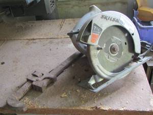 lot 273 image: skillsaw and a large pipe wrench 7 14