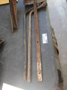 lot 293 image: 2 tire tools, 4 shelf brackets, metal fire place shovel