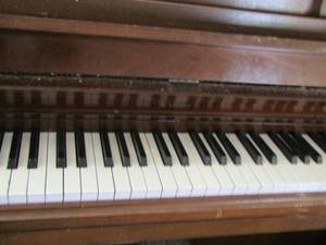 lot 502 image: 425721 Conn piano with seating bench