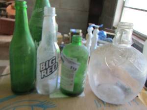 lot 519 image: big red - spite and more glass bottles