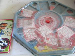 lot 322 image: 54 finest colors vintage paint box and a vintage bingo game wheel