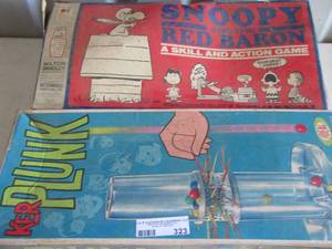 lot 323 image: kerplunk game, snoopy and the red baron games