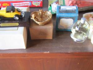 lot 380 image: 1930 roadster, heart trinket box, football helmet cologne, and more