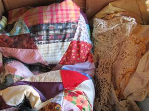 lot 384 image: box of dollies and a quilt