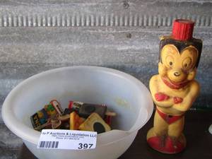 lot 397 image: bowl of fridge magnets- plastic cat bottle
