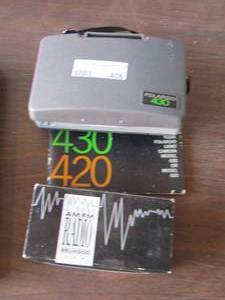 lot 406 image: polaroid 430 camera - benwood 2 band amFM radio
