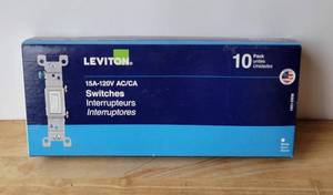 lot 60 image: LEVITON 10 PACK LIGHT SWITCHES