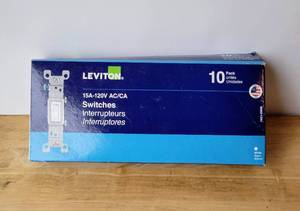 lot 63 image: LEVITON 10 PACK LIGHT SWITCHES