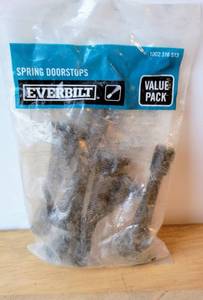 lot 74 image: EVERBILT SPRING DOORSTOPS VALUE PACK NEW SEALED