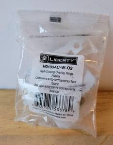lot 73 image: LIBERTY SELF-CLOSING OVERLAY HINGE NEW SEALED
