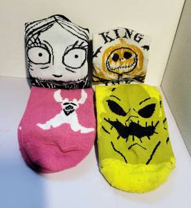 lot 108 image: LOT OF 4 VARIOUS NIGHTMARE BEFORE CHRISTMAS ANKLE SOCKS FT. OOGIE BOOGIE, SALLY